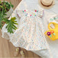 Vestido Infantil De Poá Colorido Com Flores Na Gola