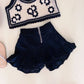 Conjunto Infantil Colete de Malha e Shorts Com Babado Na Barra