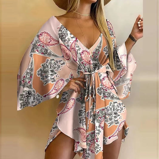 Vestido Assimétrico Curto Manga Longa Ampla Estampado Rosa